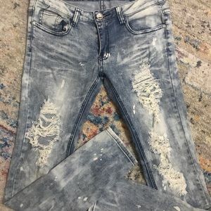 Acid wash distressed jeans